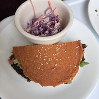Burger cut in half. And slaw. Yum.  at Try it Raw in Birmingham