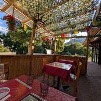 Exterior terrasse in August evening at Momo Hut in Briancon