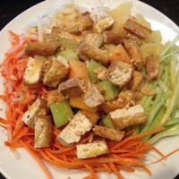 Daily special salad with lettuce, melon, carrot, pineapple, jicama & tofu. Citrus vinaigrette dressing. at Bamboozle Cafe in Tampa