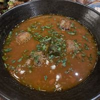 Bean Stew: Fifth Crow Farm Old Indian Woman beans, rich tomato broth, kale, rosemary croutons  at Twelvemonth in Burlingame