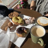 Chai Latte and Cappuccino, Mochi Balls, Passion Fruit, Hot Chocolate and Apple Donuts, Blueberry Pie - some already esten 😅  at Vio Handcrafted Pastries in Vacaville