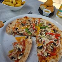 Vegan Verdure Pizza, vegan dough balls and chips. at The Lugger Inn in Penzance