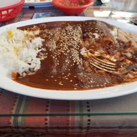 Echiladas con molé at Tarascos in Denver