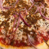  Vegan Italian sausage pizza with red onions at Pizza Donisi in Louisville