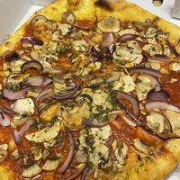 Garlic bread with tomato, mushroom and onion   at Pepe Verde in Scarborough