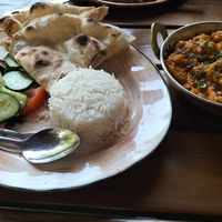 Aloo Gobi with rice, salad and naan. at The Shakespeare Pub in Almaty