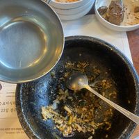 Wash the sticky rice with water and eat it  at Hankook Jib  in Jeonju