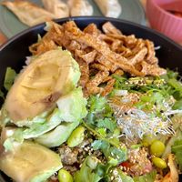 Bowl with inari & avocado + veggie dumplings.  at Miss Bowl in Helsinki