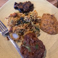 Selection of vegan curries and onion bhaji  at Infuse Modern Indian Bistro in St Albans