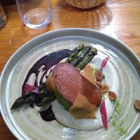 Mousseline de céleri rave au poivre de timing, rôti de seitan eu croûte d'herbes, asperges et jus de légumes a l'ail noir at La Belle Verte in Toulouse
