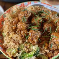 Fried rice with cauliflower bites 🤤  at The Ginger Mule in Houston