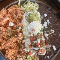 Enchilada plate that I would give a 3/5  at The Ginger Mule in Houston