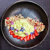 Cheesecake deconstruction with cereal, avocado an lemon at Tribu de Fuego in Bogota