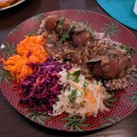 "meatballs" with mushroom sauce, buckwheat groats and slaws of my choice at Karrotka in Torun