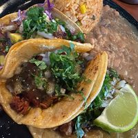 Taco dinner L to R soy al pastor, barbacoa, asada  at Penelope's Vegan Taqueria - Andersonville in Chicago