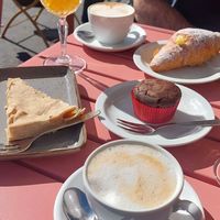 Pumpkin quiche, chocolate muffins and croissant with cream. at Flora et Labora in Milan