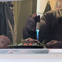 Melting cheeze for the Portobello burger! at Comewell's in North London