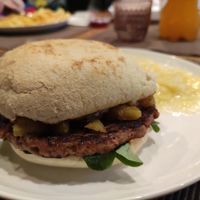 Seasonal "Pumpkin Spice" burger with potato salad at Das Delicious in Vienna
