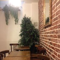 basement seating area at East Side Burgers in Paris