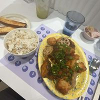Spicy Fried Oyster Mushrooms and Tofu, Rice and garlic bread on the side   at Plantude - I'Park Mall Yongsan in Seoul