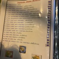 Menu with updated price. They tried to charge 110 for the fried noodle and mixed vegetable and 65 for the pad thaï  at Fong Bear in Sukhothai