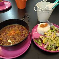 Frijolada (beans stew with saiten) + rice and salad) at María Candela  in Bogota