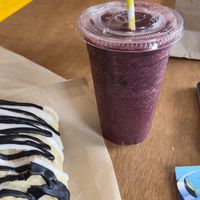 Choco croissant with berry kale smoothie  at Green Salmon Coffee and Tea House in Yachats