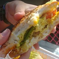 Sausage breakfast sandwhich with everything bagel at Green Salmon Coffee and Tea House in Yachats