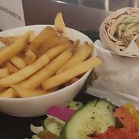 Vegan shawarma wrap with chips at Leila  in West London