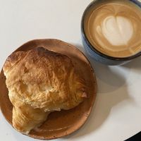 Croissant and cappuccino  at Full Bloom Café in Nice