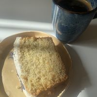 Lemon cake and americano  at Full Bloom Café in Nice