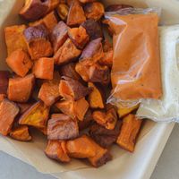 Papitas de camote con aderezo César vegano a base de almendras  at Santa Semilla in Torreon