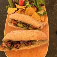 Roasted Veg. Hummus & Avocado Baguette  at The Barn Cafe  in Poole