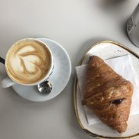 Vegan croissant w/ jam and a cappuccino w/ soy milk    at La Pâtisserie Bovio in Aosta