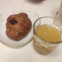 Raspberry croissant and pineapple juice at La Pâtisserie Bovio in Aosta