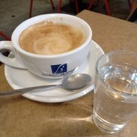 Flat white (July 2025) at AMS - Up To Do Good in Schiphol