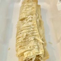 Sausage roll  at Village Fish & Chip Shop in Manchester