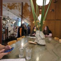Communal table at Musubu Cafe in Porto