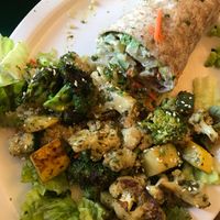 This is two entrees combined into one (we shared) one was the veggie wrap and the other was a grilled veggie salad at East West Cafe in Sebastopol