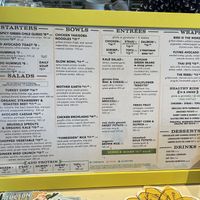 Vegan options are clearly identified on the menu by an orange symbol (small circle with a line through it).   at Flower Child in Tucson