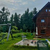 Garten mit Sandkasten und Trampolin  at Naturhaus Lehnwieser in Ramsau Am Dachstein