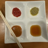 Different sauces for gyoza .  at Champagne and Gyoza Bar - Minota in Tokyo