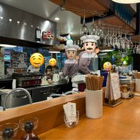 Bar and seating inside.  at Champagne and Gyoza Bar - Minota in Tokyo