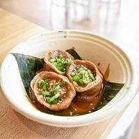 Vegan dumpling in sesame sauce at Mak Mak Organic  in Oceanside