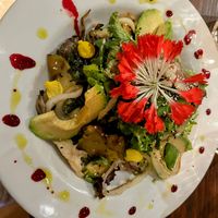 Charming husband & wife team serve organic food grown in their garden. Food and drinks all beautiful and cheap. The chocolate pumpkin bomb ordered by another table was spectacular! at Soq‘a in Cusco