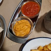 Patatas vegan side sauces at Ses Cosines Restaurant in Mallorca