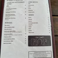 Menu! 1 leaf means vegetarian, 2 leaves mean vegan. And the brown circle means gluten free. Page 4  at Café 18 do Forte in Rio De Janeiro