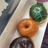 Boston, cream, glazed, and pandan chocolate  at Bitchin Donuts in Albany