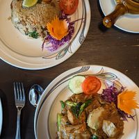 Spicy basil fried rice with mock duck (top) and pad see aew with tofu and vegetables (bottom) at Green Elephants Thai Vegan in Watkins Glen