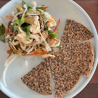 Mock chicken salad and seed crackers   at La Moi Plant-Based Restaurant in Ho Chi Minh City